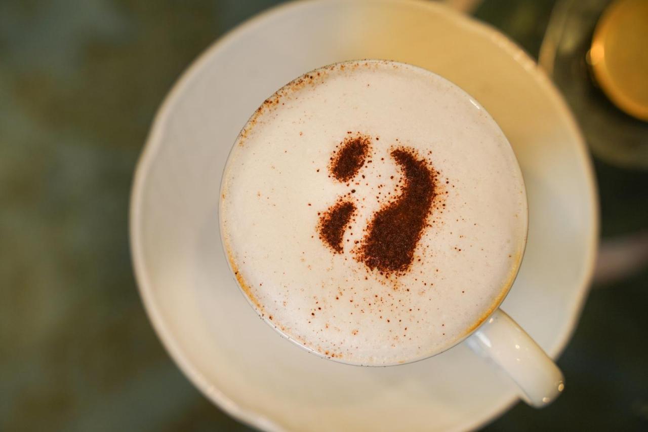 Ambiance Boutique Art Hotel Lahore Extérieur photo A cappuccino with a number 2