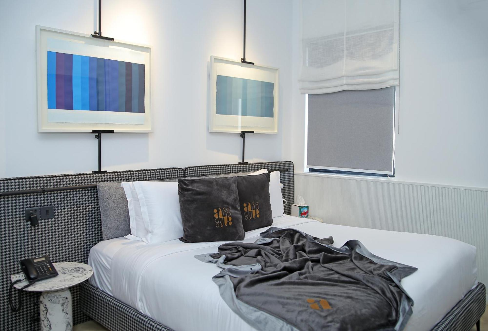 Ambiance Boutique Art Hotel Lahore Chambre photo A bedroom at the Standard East Village