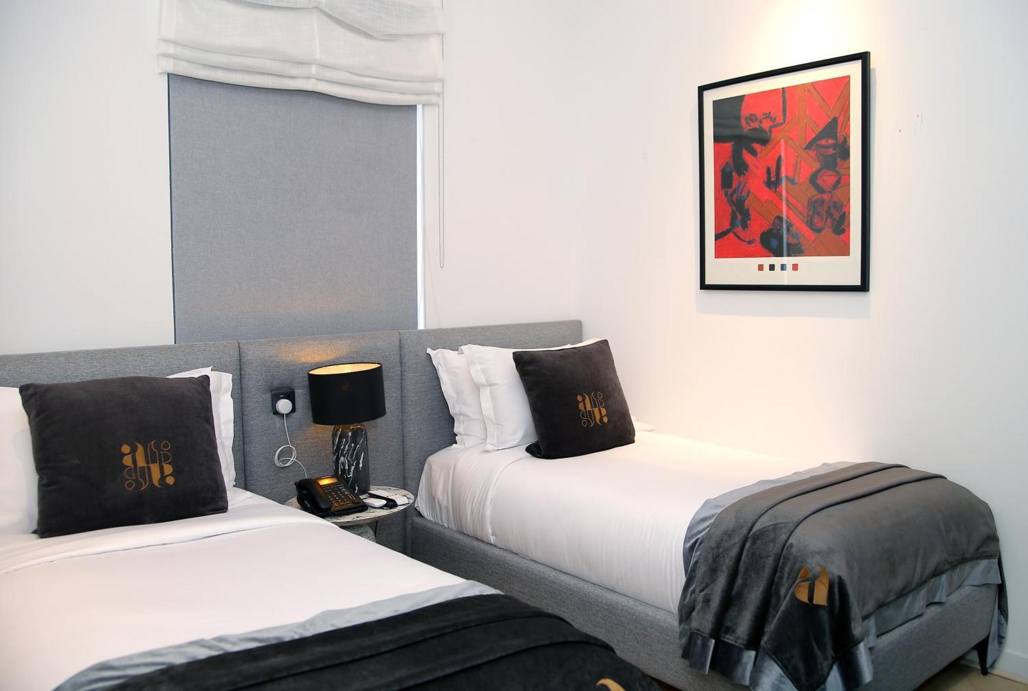 Ambiance Boutique Art Hotel Lahore Chambre photo A bedroom at the hotel